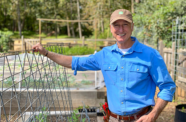 Joe Lamp'l with a livestock teepee trellis