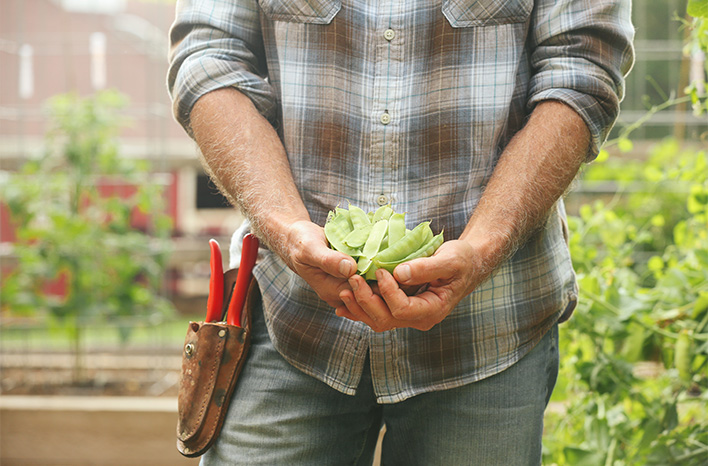 Joe holding peas