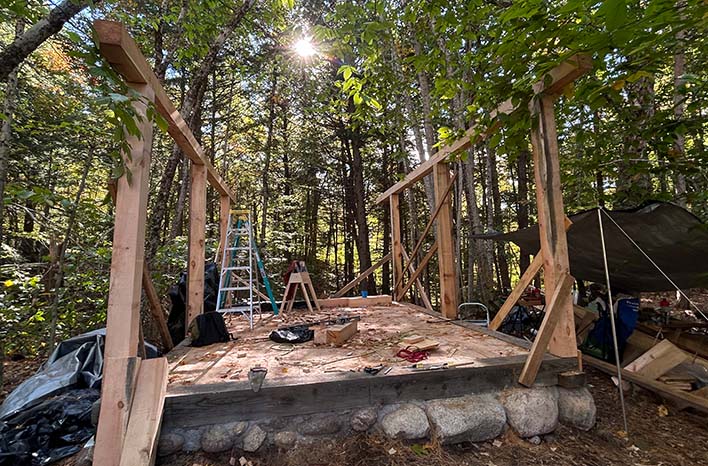 Building a replica of Henry David Thoreau's cabin.